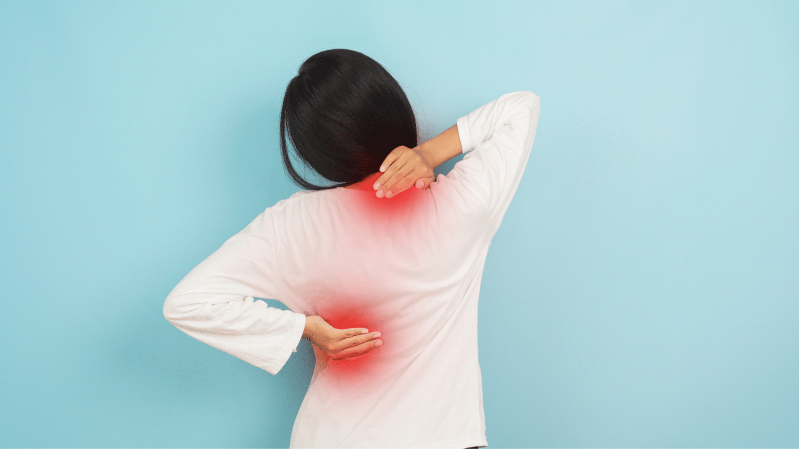 Rear View of Woman with Severe Back and Neck Ache suffering with chronic pain