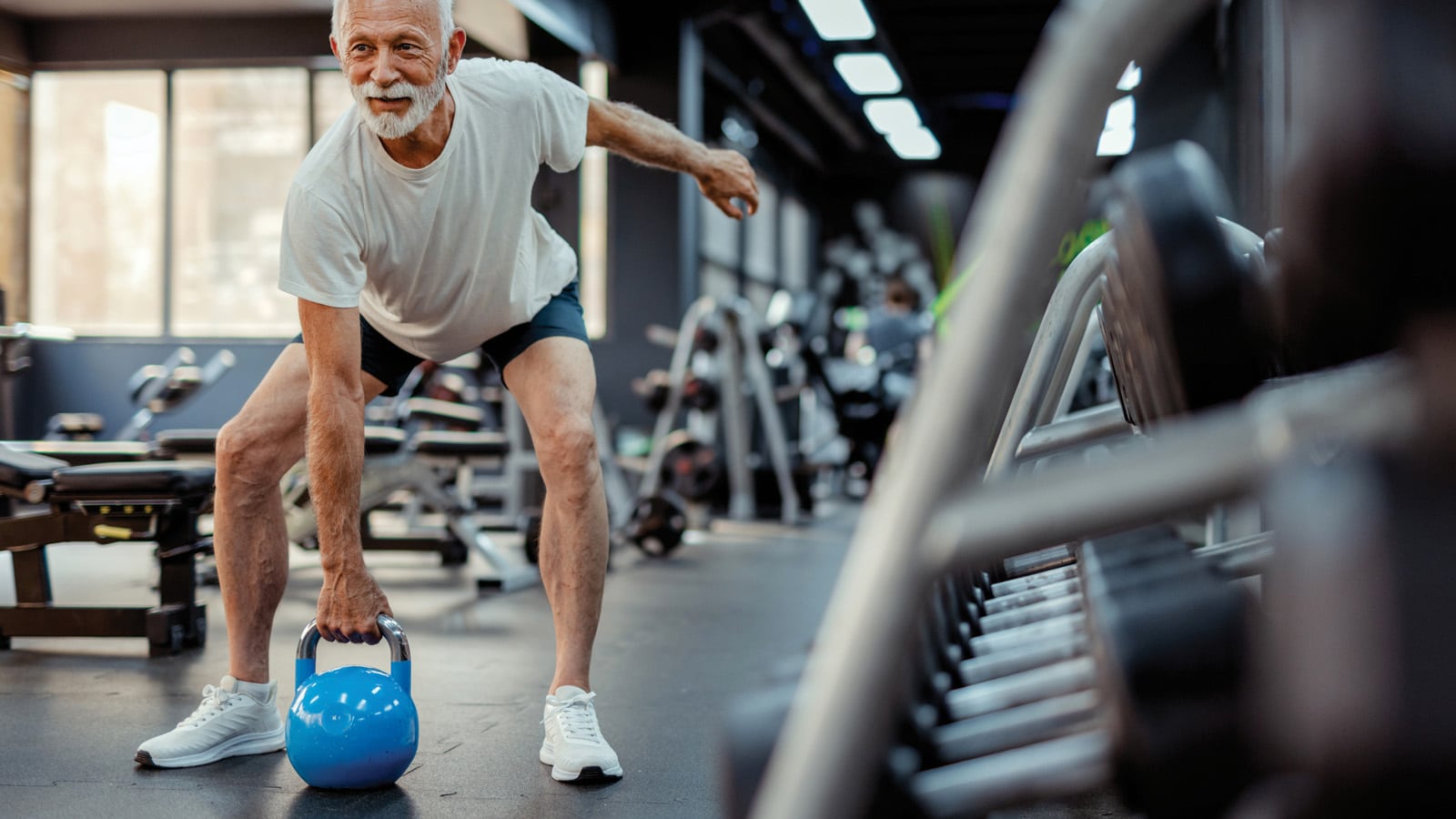 Older man with imbalance doing his physical fitness program